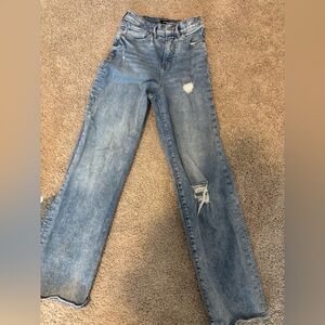 Distressed Blue Jeans